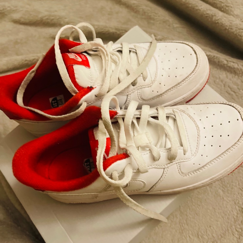 Red & white Nike Air Force ones . Minimal dirt ,great condition ,size 2.5